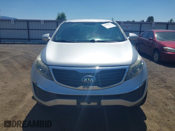 2013 Kia Sportage LX with VIN KNDPBCA24D7352828, listed as a IAAI auction lot 42685744 with 156,805 mi miles and . Bid and sale history available at DreamBid. Image 12.