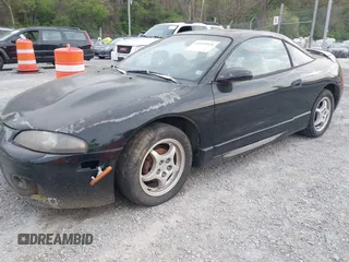 1997 Mitsubishi Eclipse with VIN 4A3AK44Y1VE042951, listed as a IAAI auction lot 42103920 with 119,268 mi miles and . Bid and sale history available at DreamBid. Image 2.