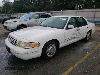 1999 Ford Crown Victoria z VIN 2FAFP73W8XX150079, wystawiony jako Copart lot #78923624 z przebiegiem 128 510 mil mil oraz Szkody całkowita. Historia ofert i sprzedaży dostępna na DreamBid. Obrazek 1.