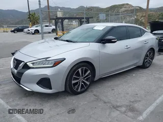 2020 Nissan Maxima SV with VIN 1N4AA6CVXLC380646, listed as a IAAI auction lot 42041422 with 99,579 mi miles and . Bid and sale history available at DreamBid. Image 2.
