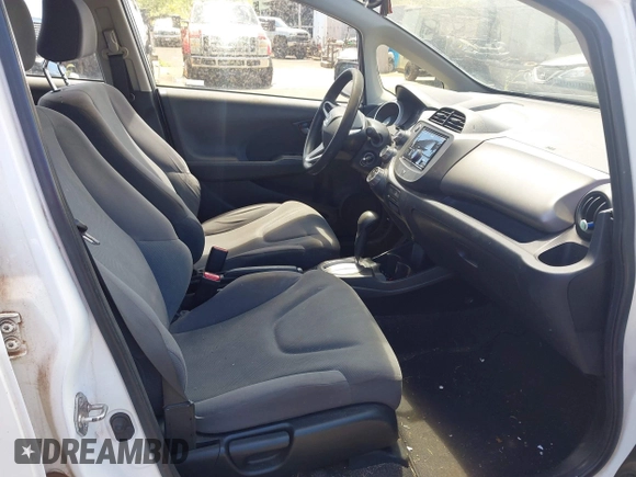 2013 Honda Fit with VIN JHMGE8H39DC051724, listed as a IAAI auction lot 41881732 with 158,048 mi miles. Bid and sale history available at carsss.com. Image 5.