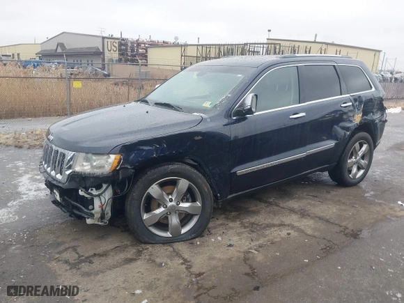 2012 Jeep Grand Cherokee Overland with VIN 1C4RJFCT9CC182216, listed as a IAAI auction lot 41490446 with 153,237 mi miles. Bid and sale history available at carsss.com. Image 2.