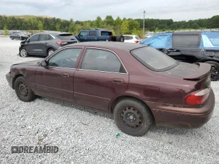 2000 Mazda 626 LX with VIN 1YVGF22D8Y5126950, listed as a Copart auction lot 69440124 with 208,584 mi miles and Salvage Title. Bid and sale history available at carsss.com. Image 2.