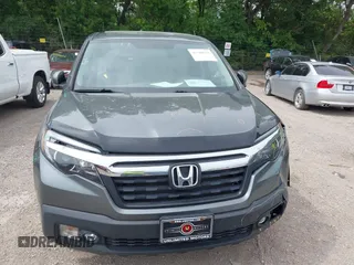 2018 Honda Ridgeline RTL-T with VIN 5FPYK3F61JB013733, listed as a IAAI auction lot 42548122 with 92,407 mi miles and . Bid and sale history available at DreamBid. Image 12.