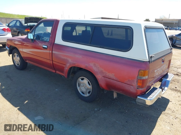 1992 Toyota Pickup DLX z VIN 4TARN81PXNZ030799, wystawiony jako IAAI lot #41879500 z przebiegiem 221 198 mil mil oraz . Historia ofert i sprzedaży dostępna na DreamBid. Obrazek 3.