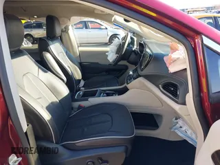 2023 Chrysler Pacifica Hybrid Limited with VIN 2C4RC1S7XPR518695, listed as a IAAI auction lot 41301401 with 24,433 mi miles and . Bid and sale history available at DreamBid. Image 5.