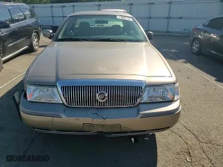 2003 Mercury Grand Marquis GS Convenience with VIN 2MEFM74WX3X707679, listed as a Copart auction lot 73963754 with 75,143 mi miles and Salvage Title. Bid and sale history available at carsss.com. Image 10.