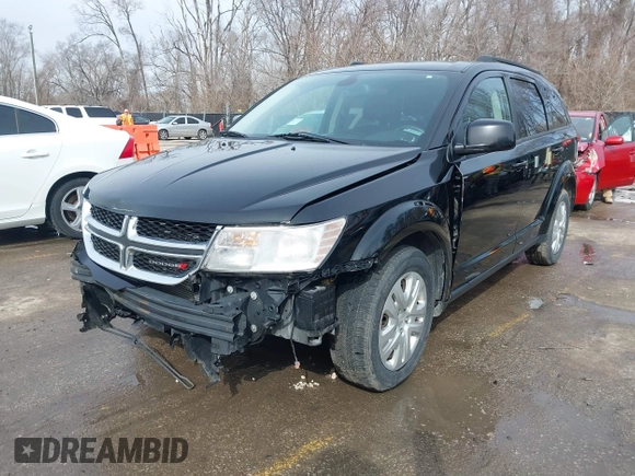 2019 Dodge Journey SE with VIN 3C4PDCBB8KT844800, listed as a IAAI auction lot 41721062 with 148,390 mi miles and . Bid and sale history available at DreamBid. Image 2.