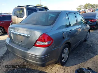 2011 Nissan Versa 1.8 S with VIN 3N1BC1AP9BL423170, listed as a IAAI auction lot 41821121 with 246,940 mi miles. Bid and sale history available at carsss.com. Image 4.