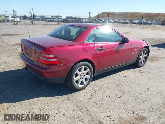 1999 Mercedes-Benz SLK 230/320 with VIN WDBKK47F5XF112125, listed as a IAAI auction lot 42207615 with 93,962 mi miles and . Bid and sale history available at DreamBid. Image 4.