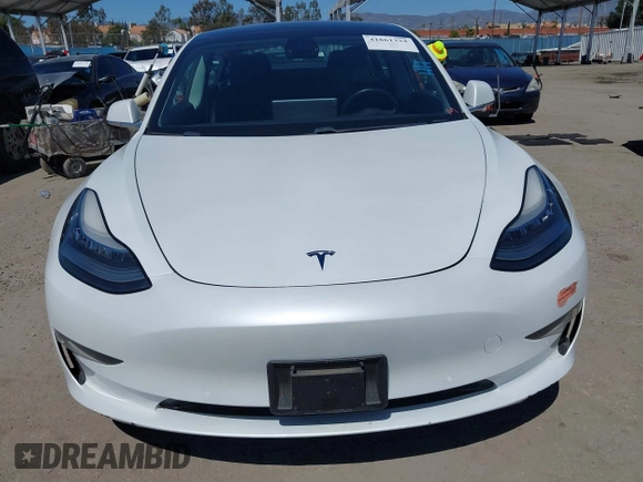 2019 Tesla Model 3 Mid Range with VIN 5YJ3E1EA1KF422983, listed as a IAAI auction lot 41861334 with 53,017 mi miles. Bid and sale history available at carsss.com. Image 12.