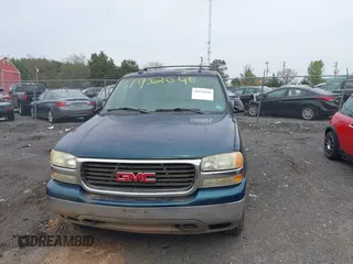2005 GMC Yukon SLT with VIN 1GKEK13T15R196436, listed as a IAAI auction lot 41952646 with 247,487 mi miles. Bid and sale history available at carsss.com. Image 6.