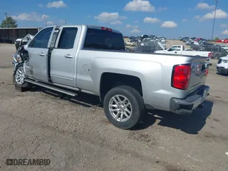 2016 Chevrolet Silverado 1500 LT with VIN 1GCRCREC3GZ119267, listed as a IAAI auction lot 40692574 with 136,704 mi miles. Bid and sale history available at carsss.com. Image 3.