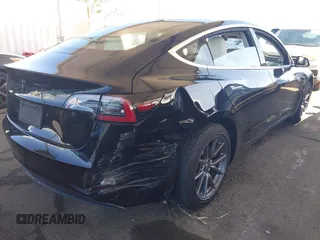 2020 Tesla Model 3 Standard Range Plus with VIN 5YJ3E1EA8LF661982, listed as a IAAI auction lot 41700109 with 30,271 mi miles and . Bid and sale history available at DreamBid. Image 4.