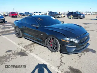 2022 Ford Mustang GT with VIN 1FA6P8CFXN5133689, listed as a IAAI auction lot 41872122 with 26,838 mi miles. Bid and sale history available at carsss.com. Image 1.