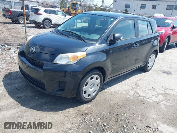2010 Scion xD with VIN JTKKU4B48A1006962, listed as a IAAI auction lot 42097112 with 135,178 mi miles. Bid and sale history available at carsss.com. Image 2.