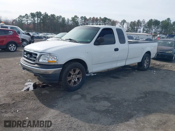 2000 Ford F-150 XL with VIN 1FTRX17LXYNC39983, listed as a IAAI auction lot 41750277 with 170,016 mi miles. Bid and sale history available at carsss.com. Image 17.