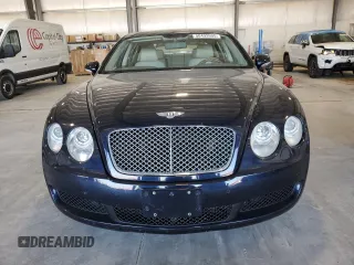 2006 Bentley Flying Spur z VIN SCBBR53W06C037412, wystawiony jako Copart lot #50492605 z przebiegiem 59 005 mil mil oraz Szkody całkowita. Historia ofert i sprzedaży dostępna na DreamBid. Obrazek 5.