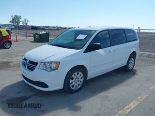 2014 Dodge Grand Caravan American Value with VIN 2C4RDGBG8ER140342, listed as a IAAI auction lot 42198306 with 135,564 mi miles and . Bid and sale history available at DreamBid. Image 2.