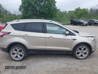 2018 Ford Escape Titanium with VIN 1FMCU9J94JUA44964, listed as a IAAI auction lot 42494471 with 100,955 mi miles and . Bid and sale history available at DreamBid. Image 13.