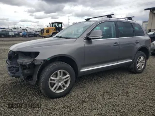 2009 Volkswagen Touareg VR6 z VIN WVGBE77L99D012801, wystawiony jako Copart lot #46179535 z przebiegiem 215 784 mil mil oraz Szkoda całkowita • Salvage title. Historia ofert i sprzedaży dostępna na DreamBid. Obrazek 1.