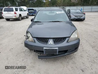2004 Mitsubishi Lancer OZ-Rally with VIN JA3AJ86E04U029594, listed as a Copart auction lot 73143284 with 71,623 mi miles and Clean Title. Bid and sale history available at carsss.com. Image 5.