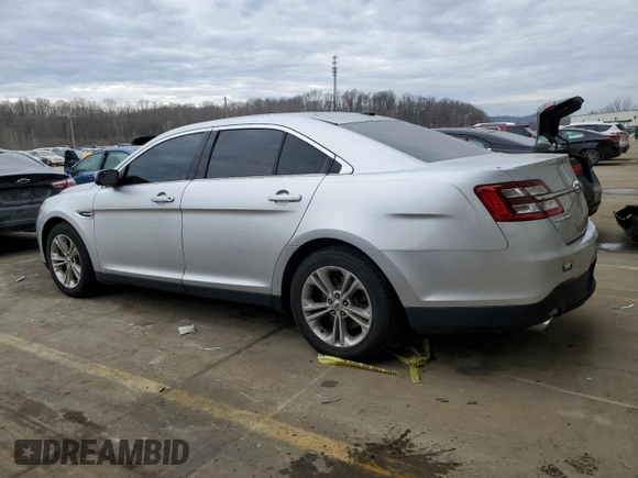 2017 Ford Taurus SEL with VIN 1FAHP2E88HG134983, listed as a Copart auction lot 43111015 with 107,121 mi miles and Non Repairable. Bid and sale history available at DreamBid. Image 2.