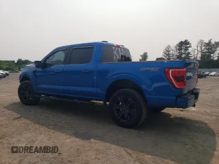 2021 Ford F-150 XL with VIN 1FTEW1EP7MFC02143, listed as a Copart auction lot 59140805 with 27,789 mi miles and Salvage title. Bid and sale history available at DreamBid. Image 2.