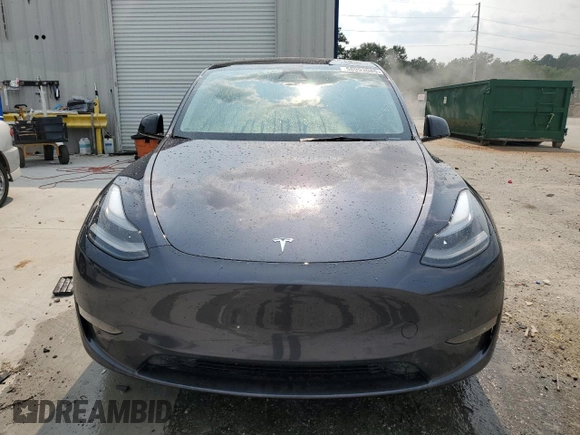 2024 Tesla Model Y Long Range with VIN 7SAYGDEE0RA255613, listed as a Copart auction lot 58993085 with 39,336 mi miles and Salvage title. Bid and sale history available at DreamBid. Image 5.