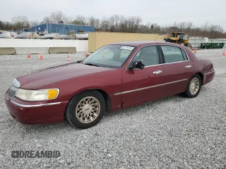 1998 Lincoln Town Car Signature with VIN 1LNFM82WXWY721317, listed as a Copart auction lot 52778735 with 125,354 mi miles and Salvage title. Bid and sale history available at DreamBid. Image 1.