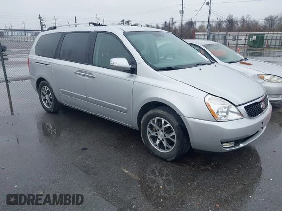 2014 Kia Sedona EX with VIN KNDMH4C76E6541200, listed as a IAAI auction lot 41657002 with 141,377 mi miles. Bid and sale history available at carsss.com. Image 1.