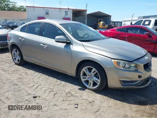 2015 Volvo S60 T5 Drive-E Premier Plus with VIN YV140MFC9F1318920, listed as a IAAI auction lot 41930684 with 66,790 mi miles. Bid and sale history available at carsss.com. Image 1.