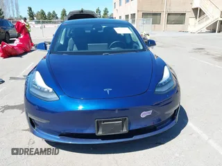2019 Tesla Model 3 Mid Range with VIN 5YJ3E1EA0KF425079, listed as a IAAI auction lot 41871022 with 61,684 mi miles and . Bid and sale history available at DreamBid. Image 12.