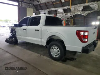 2022 Ford F-150 XL with VIN 1FTFW1E57NKD28966, listed as a Copart auction lot 55878125 with 77,121 mi miles and Salvage title. Bid and sale history available at DreamBid. Image 2.