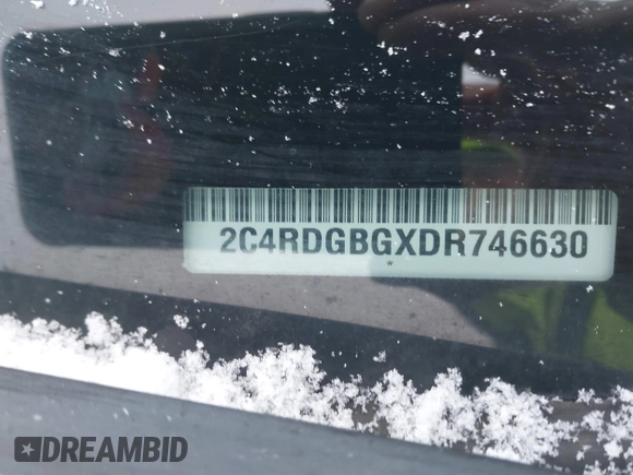 2013 Dodge Grand Caravan SE with VIN 2C4RDGBGXDR746630, listed as a IAAI auction lot 41239381 with 213,421 mi miles and . Bid and sale history available at DreamBid. Image 9.