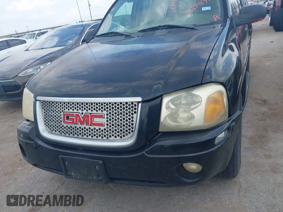 2004 GMC Envoy SLE with VIN 1GKDS13SX42398363, listed as a IAAI auction lot 42154134 with 308,001 mi miles and . Bid and sale history available at DreamBid. Image 6.