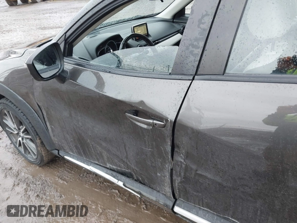 2016 Mazda CX-3 Grand Touring with VIN JM1DKBD77G0107328, listed as a IAAI auction lot 41682949 with 156,935 mi miles. Bid and sale history available at carsss.com. Image 6.
