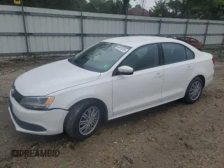 2014 Volkswagen Jetta SE with VIN 3VWD17AJ5EM365810, listed as a Copart auction lot 60676755 with 119,975 mi miles and Salvage title. Bid and sale history available at DreamBid. Image 1.