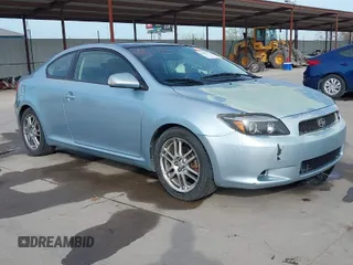 2006 Scion tC with VIN JTKDE167060103157, listed as a IAAI auction lot 41867710 with 221,441 mi miles. Bid and sale history available at carsss.com. Image 1.