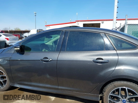 2015 Ford Focus SE with VIN 1FADP3F29FL268677, listed as a IAAI auction lot 42037244 with 118,018 mi miles. Bid and sale history available at carsss.com. Image 15.