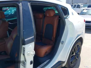 2019 Maserati Levante GranLusso z VIN ZN661XUL4KX319060, wystawiony jako IAAI lot #41823485 z przebiegiem 126 815 mil mil oraz . Historia ofert i sprzedaży dostępna na DreamBid. Obrazek 19.