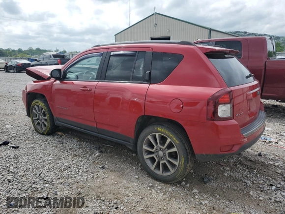 2016 Jeep Compass Sport SE with VIN 1C4NJDBB0GD759999, listed as a Copart auction lot 56983255 with 69,548 mi miles and Salvage title. Bid and sale history available at DreamBid. Image 2.
