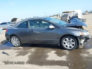 2009 Honda Civic Cpe LX with VIN 2HGFG12699H540664, listed as a IAAI auction lot 42100966 with Not Provided miles. Bid and sale history available at carsss.com. Image 14.
