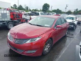2015 Lincoln MKZ z VIN 3LN6L2GK8FR616005, wystawiony jako IAAI lot #42804770 z przebiegiem 241 352 mil mil oraz . Historia ofert i sprzedaży dostępna na DreamBid. Obrazek 2.