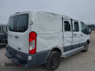 2016 Ford Transit Cargo z VIN 1FTYR1ZM3GKB36643, wystawiony jako IAAI lot #41127604 z przebiegiem 182 845 mil mil oraz . Historia ofert i sprzedaży dostępna na DreamBid. Obrazek 17.