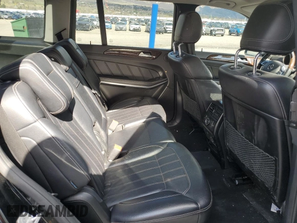 2013 Mercedes-Benz GL 450 z VIN 4JGDF7CE0DA251791, wystawiony jako Copart lot #51180575 z przebiegiem 175 989 mil mil oraz Szkoda całkowita • Salvage title. Historia ofert i sprzedaży dostępna na DreamBid. Obrazek 11.