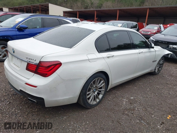 2014 BMW 7 Series ALPINA B7 with VIN WBAYE8C55ED134980, listed as a IAAI auction lot 41239686 with 145,435 mi miles. Bid and sale history available at carsss.com. Image 4.