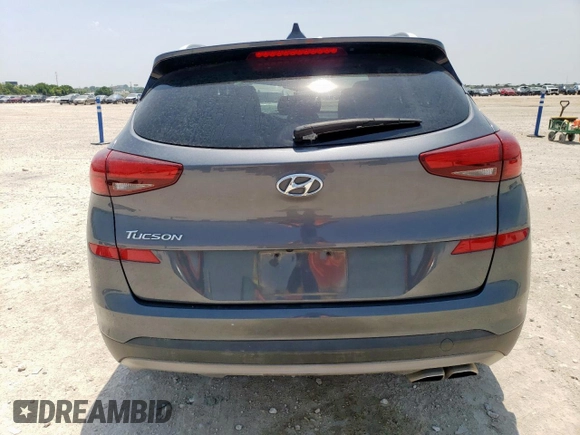 2021 Hyundai Tucson SEL with VIN KM8J33AL0MU296945, listed as a Copart auction lot 57137515 with 54,657 mi miles and Salvage title. Bid and sale history available at DreamBid. Image 6.
