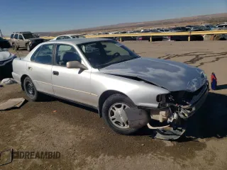 1996 Toyota Camry DX with VIN 4T1BG12K0TU744733, listed as a Copart auction lot 45302005 with 136,736 mi miles and Salvage Title. Bid and sale history available at carsss.com. Image 4.