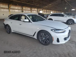 2023 BMW 4 Series 430i xDrive with VIN WBA73AV06PFN88754, listed as a Copart auction lot 80533254 with 28,502 mi miles and Salvage title. Bid and sale history available at DreamBid. Image 4.